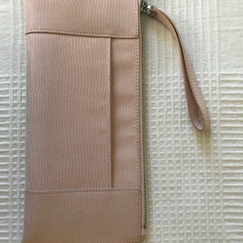 White House Black Market soft pink clutch